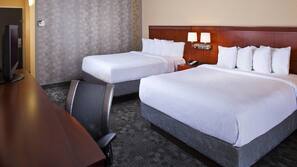 Premium bedding, desk, laptop workspace, iron/ironing board