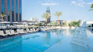 4 outdoor pools, open 8:00 AM to 6:00 PM, pool cabanas (surcharge)
