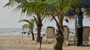 Beach nearby, white sand, sun loungers, beach umbrellas