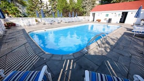 Outdoor pool, pool umbrellas, sun loungers