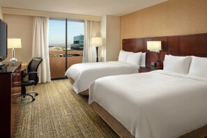 Premium bedding, pillowtop beds, desk, laptop workspace