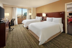 Premium bedding, pillowtop beds, desk, laptop workspace