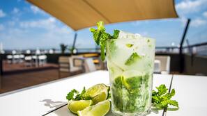 Seasonal outdoor pool, open 9:00 AM to 9:00 PM, pool loungers
