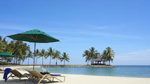 On the beach, scuba diving, snorkeling, water skiing
