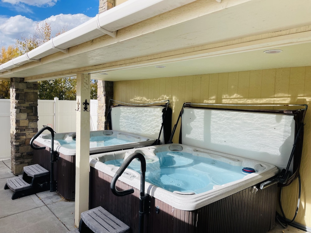 Outdoor spa tub, Days Inn & Suites by Wyndham Gunnison