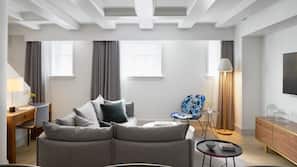 Luxe beddengoed, een minibar, een kluis op de kamer, een bureau