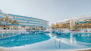 2 outdoor pools, pool umbrellas, lifeguards on site