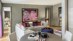 Luxe beddengoed, een minibar, een kluis op de kamer, een bureau