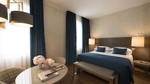 Luxe beddengoed, een minibar, een kluis op de kamer, een bureau