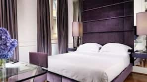 Premium bedding, down comforters, minibar, in-room safe