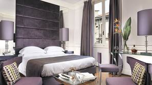 Premium bedding, down comforters, minibar, in-room safe
