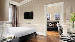 Premium bedding, down comforters, minibar, in-room safe
