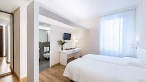 Ropa de cama de alta calidad, minibar, caja fuerte