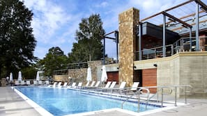 Outdoor pool, open 7 AM to 9 PM, pool umbrellas, pool loungers
