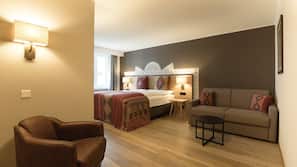 Premium bedding, down comforters, in-room safe, desk