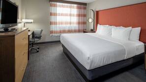 Premium bedding, pillow top beds, desk, laptop workspace