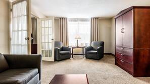 Desk, blackout drapes, iron/ironing board, rollaway beds