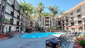 Outdoor pool, open 7:00 AM to 10:00 PM, sun loungers