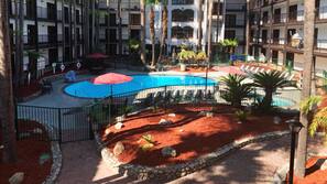 Outdoor pool, open 7:00 AM to 10:00 PM, sun loungers