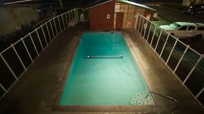 Seasonal outdoor pool, open 11:00 AM to 7:00 PM, sun loungers