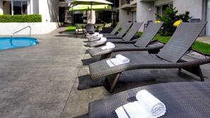 Outdoor pool, pool umbrellas, pool loungers