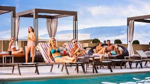Outdoor pool, open 9:00 AM to 9:00 PM, cabanas (surcharge)