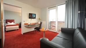 Hypoallergeen beddengoed, een minibar, een kluis op de kamer, een bureau