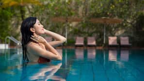 Outdoor pool, open 6:00 AM to 11:00 PM, sun loungers