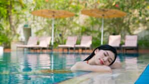 Outdoor pool, open 6:00 AM to 11:00 PM, sun loungers