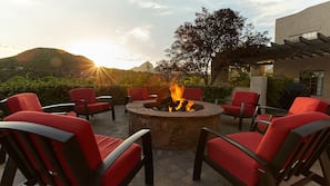2 outdoor pools, open 7:00 AM to 10:00 PM, pool umbrellas
