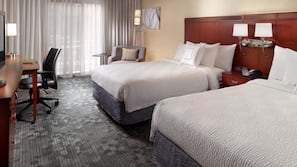 Premium bedding, desk, laptop workspace, iron/ironing board