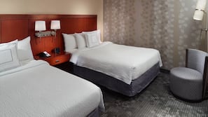 Premium bedding, desk, laptop workspace, iron/ironing board