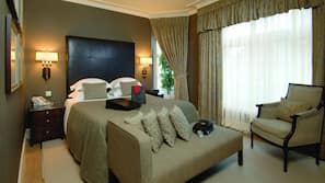 Ropa de cama de alta calidad, minibar, caja fuerte