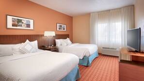 Premium bedding, down comforters, pillowtop beds, iron/ironing board
