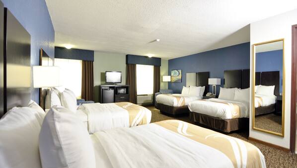 Premium bedding, blackout drapes, iron/ironing board