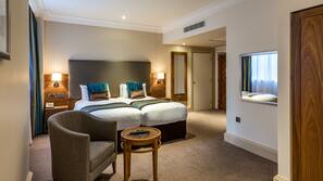 Premium bedding, free minibar, in-room safe, desk