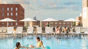 Outdoor pool, open 6:00 AM to 11:00 PM, cabanas (surcharge)