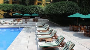 Outdoor pool, pool umbrellas, sun loungers