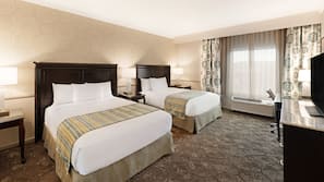 Premium bedding, down comforters, pillowtop beds, in-room safe