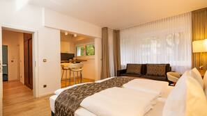 Premium bedding, desk, laptop workspace, blackout curtains