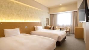 Desk, blackout curtains, free WiFi, linens