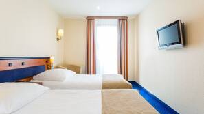 Premium bedding, desk, laptop workspace, free WiFi