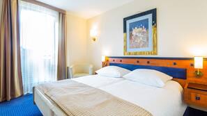 Premium bedding, desk, laptop workspace, free WiFi