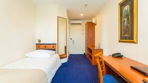Premium bedding, desk, laptop workspace, free WiFi