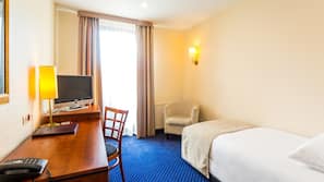 Premium bedding, desk, laptop workspace, free WiFi