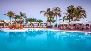 2 outdoor pools, pool umbrellas, pool loungers