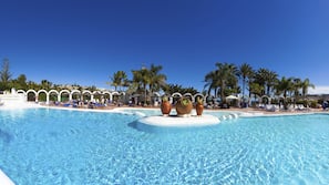 2 outdoor pools, pool umbrellas, pool loungers