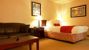 Premium bedding, desk, laptop workspace, blackout drapes