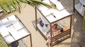 On the beach, free beach cabanas, sun loungers, beach umbrellas