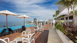 Outdoor pool, free cabanas, pool umbrellas